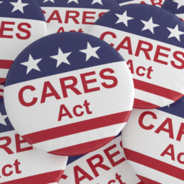 Pile of CARES Act Buttons